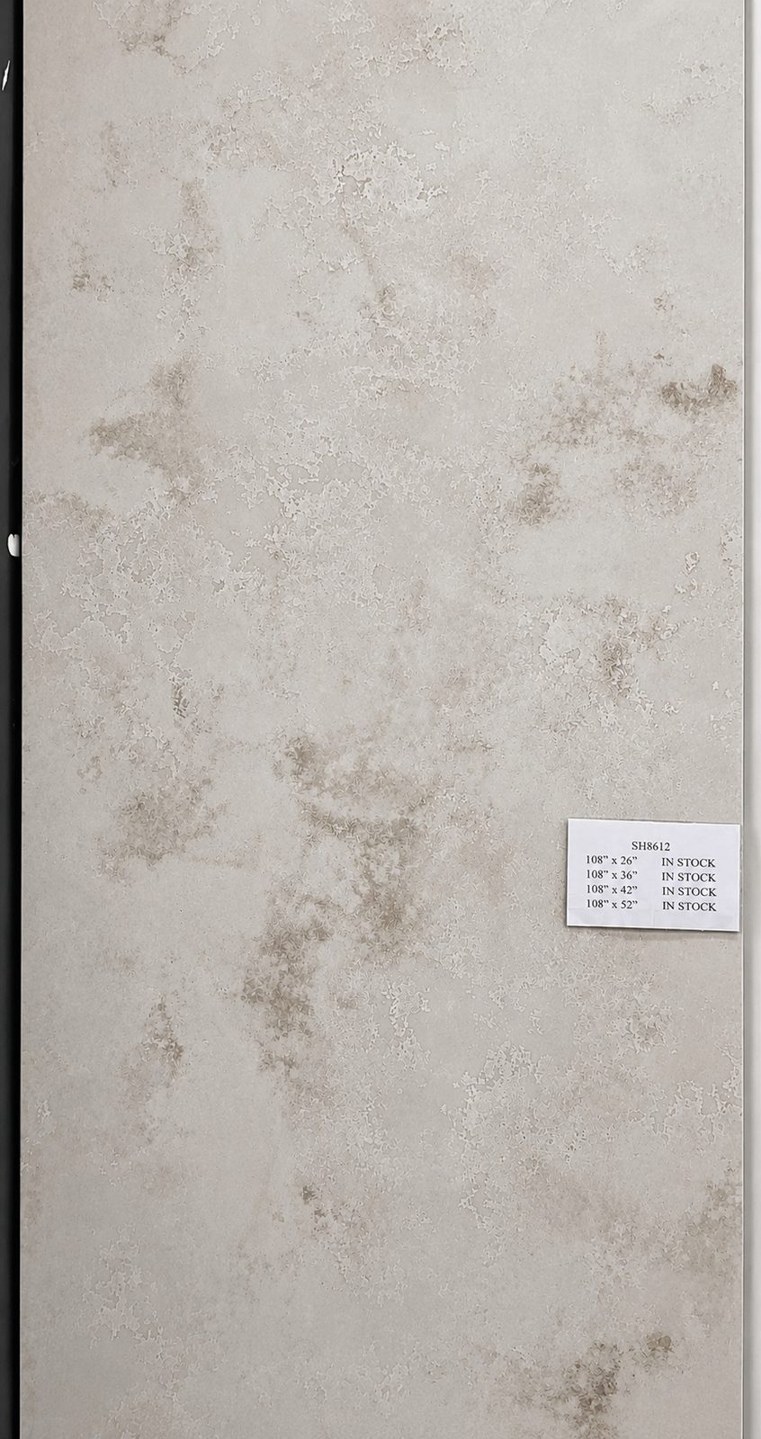 Warm gray quartz with soft cloudy mottling. — full slab