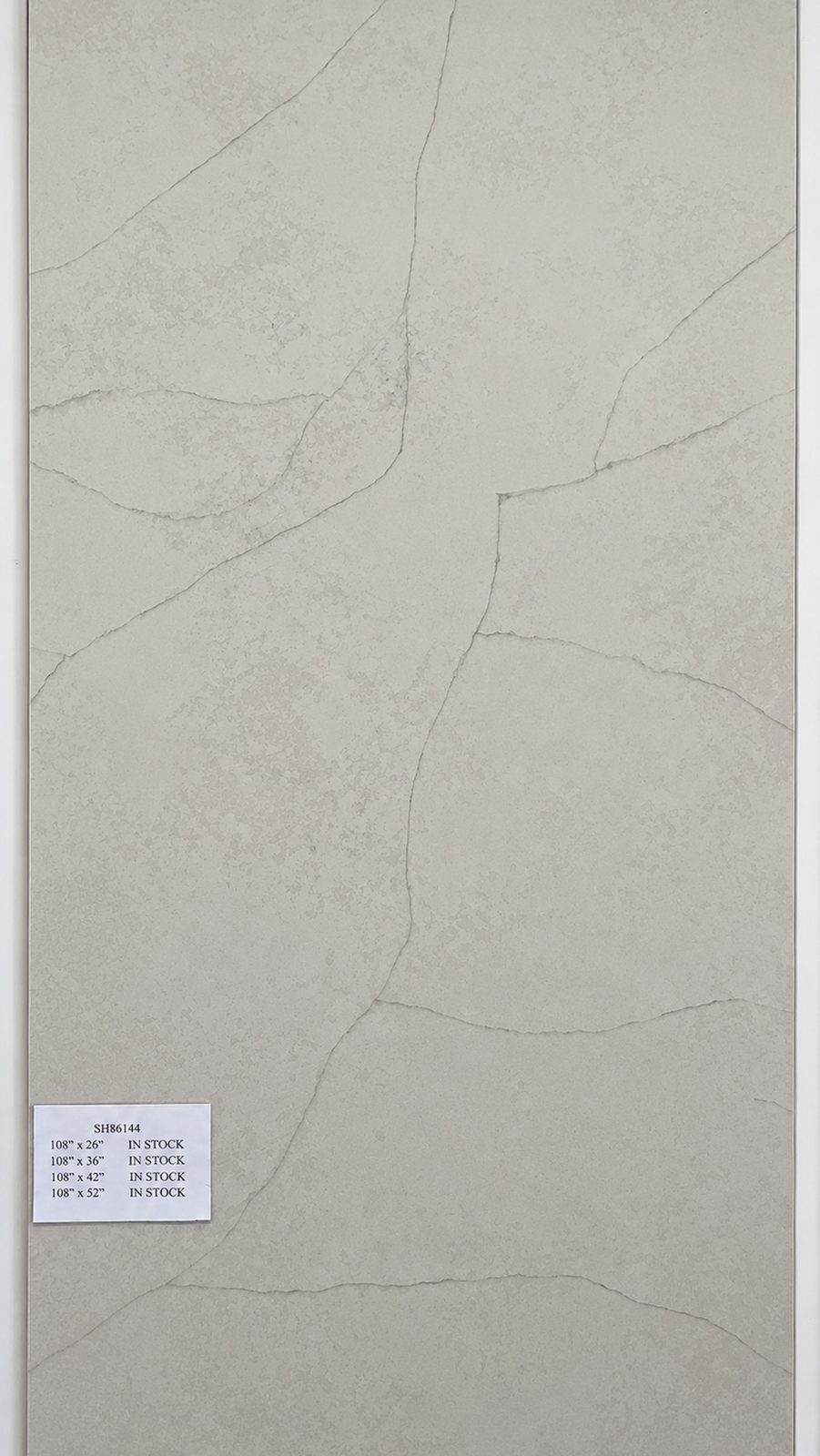 White quartz with faint, fine gray veining. — full slab
